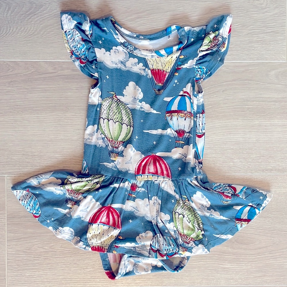 Posh Peanut Skirted Bodysuit